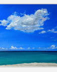Painting of a blue sky with white clouds over a turquoise ocean.
