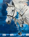 A striking artwork print of a grey horse in mid-air against a vibrant blue backdrop, from the Horse Collection by Weatherly Stroh.