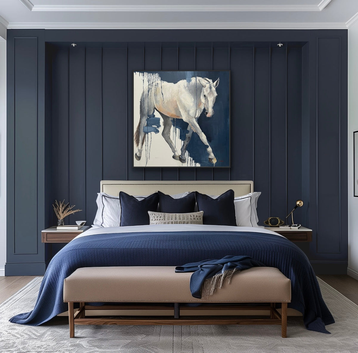 Modern bedroom with dark blue paneled walls, a bed with blue and white bedding, and a horse painting above the bed.