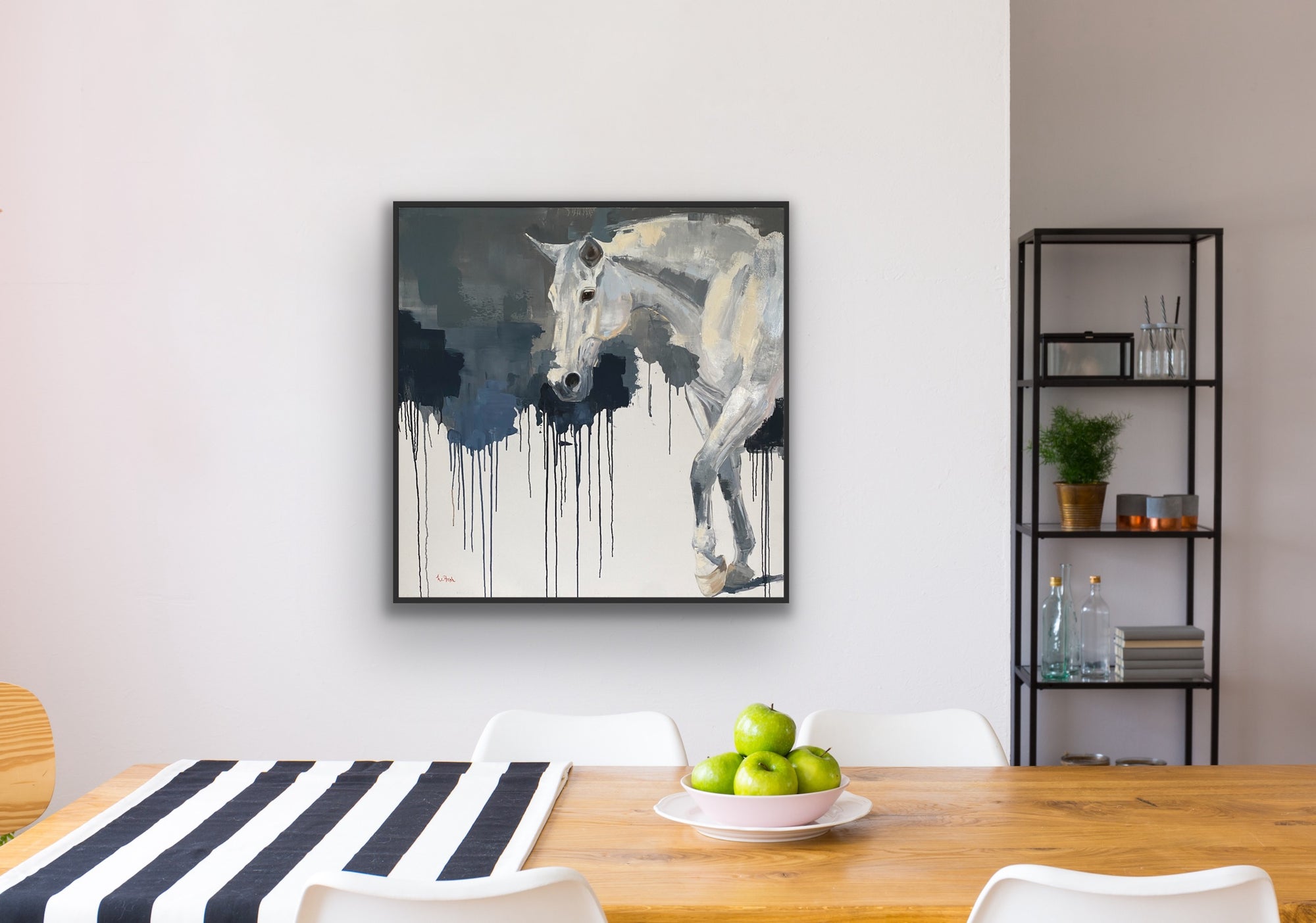 A white wall with a painting of a white horse walking and dripping dark background. 